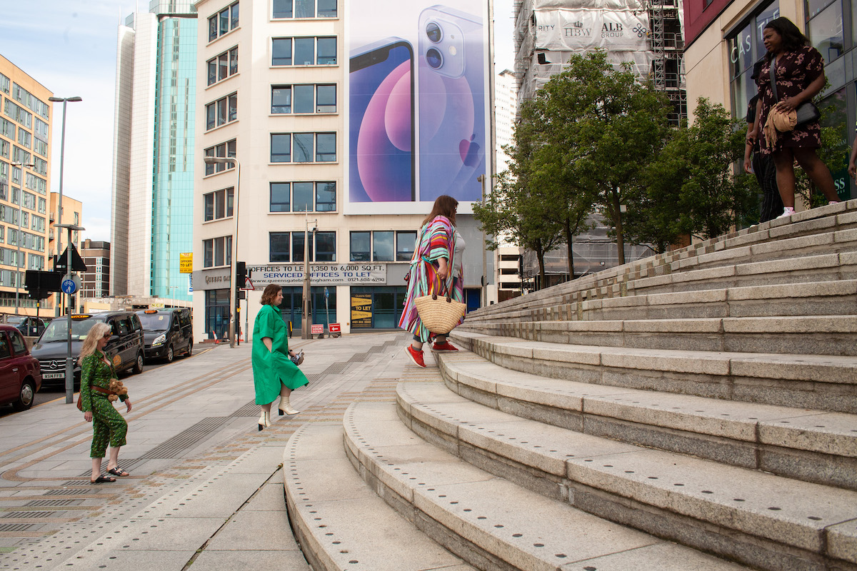 Three crones walking up staircase to Mailbox Birmingham